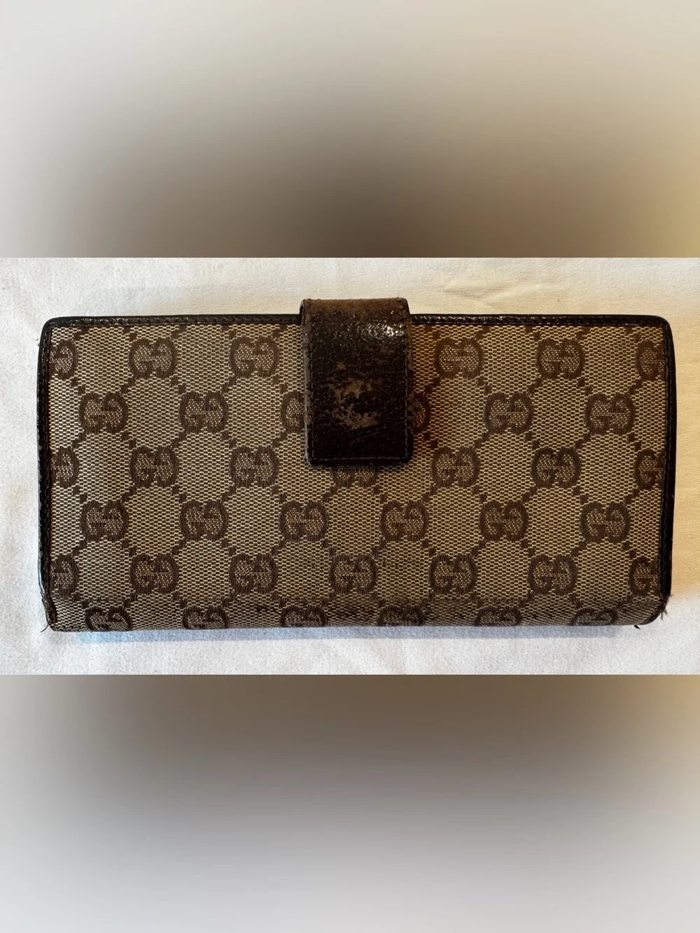 Authentic pre Loved Gucci Brown Monogram Continental Wallet.
